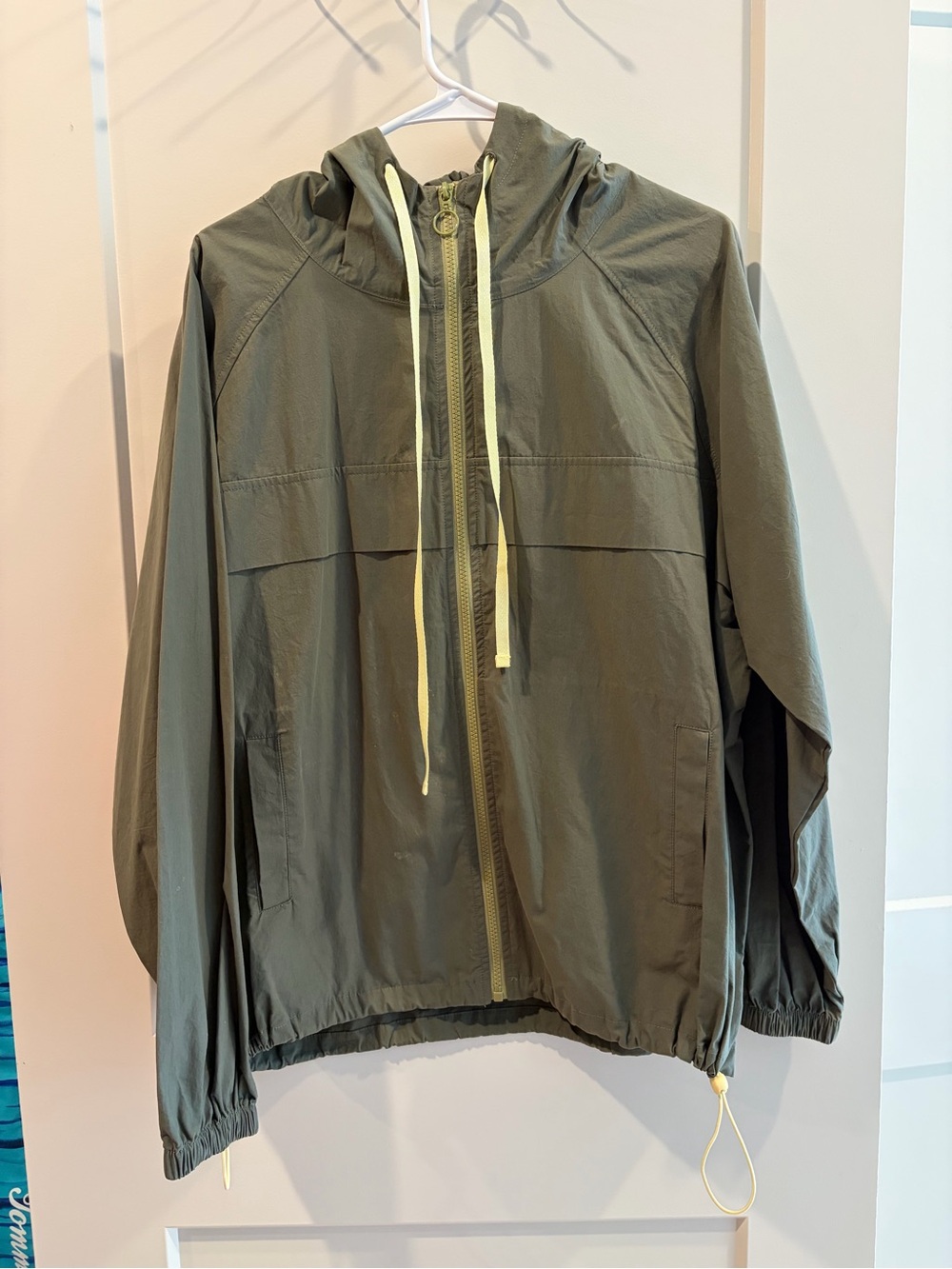 Fabletics Olive Green Hooded Windbreaker with Yellow Drawcords